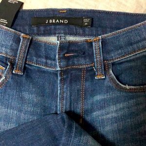 J Brand jeans with slight flare fringe hem. Size 25.